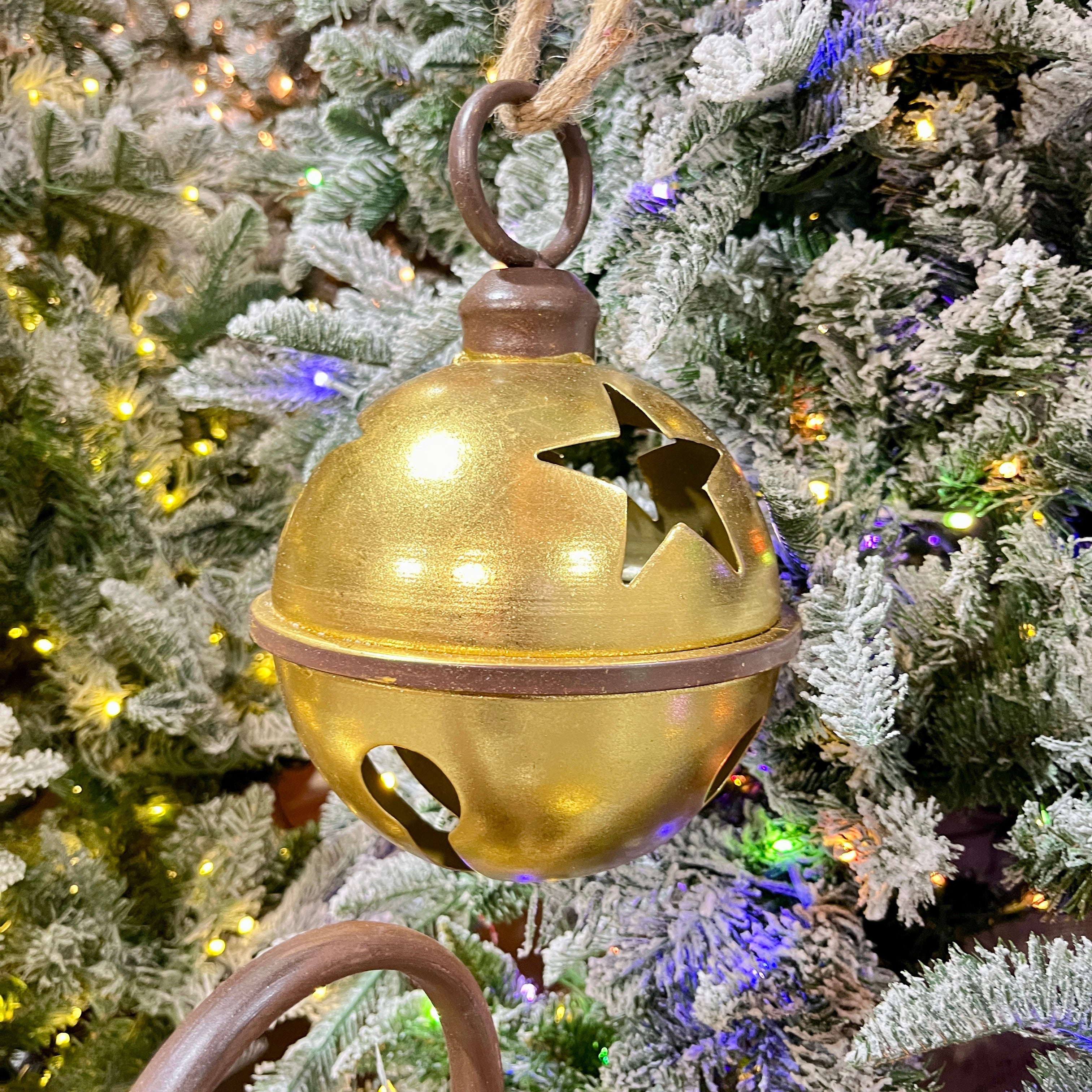 Gold star metal bell on 10" rope