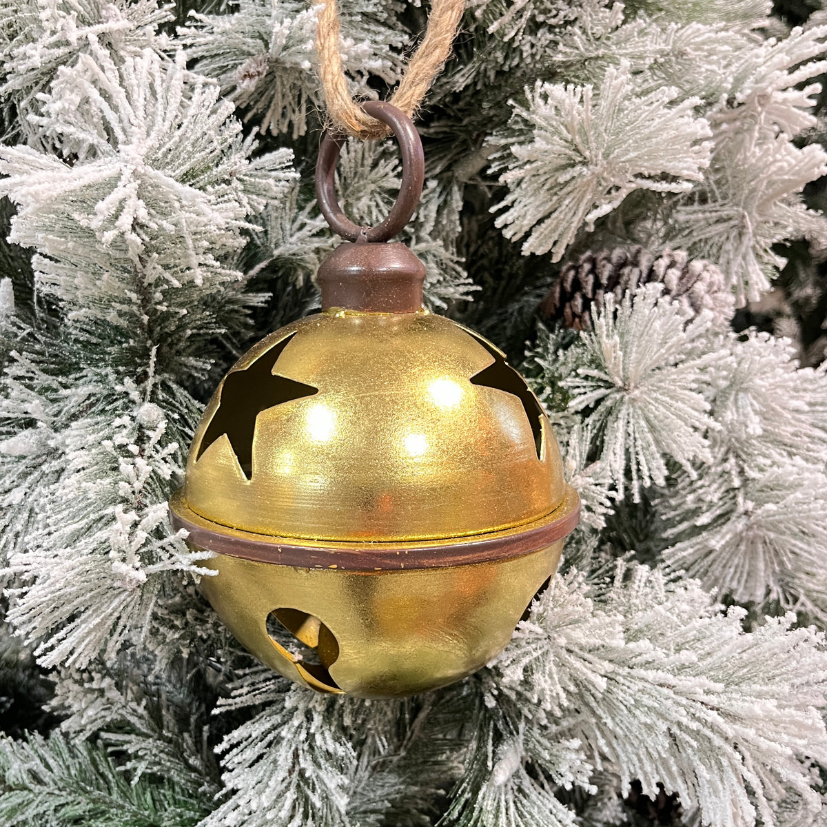 Gold star metal bell on 10" rope